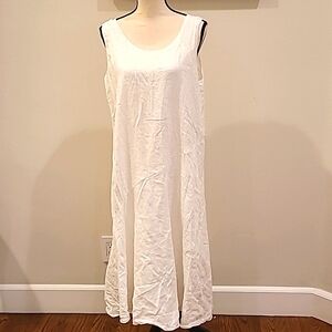 White sleeveless two-piece linen dress